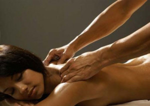 Massage of a woman by a man